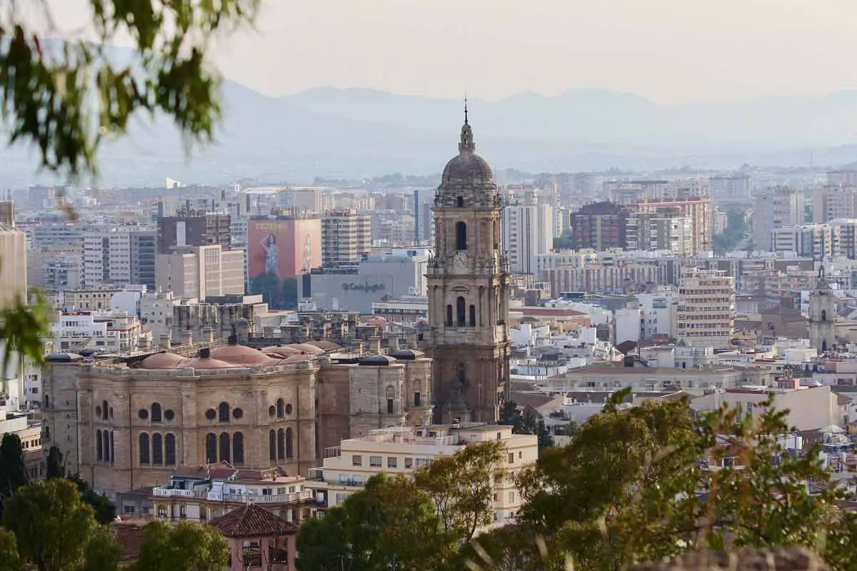 An aerial view of the Cathedral in Malaga and its tower, against the backdrop of the city
